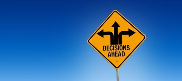 yellow-sign-decisions-ahead-arrows