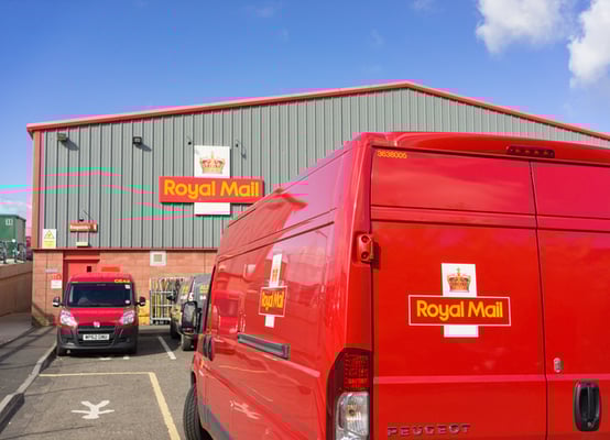 parked-red-royal-mail-vans-storage-location-car-park